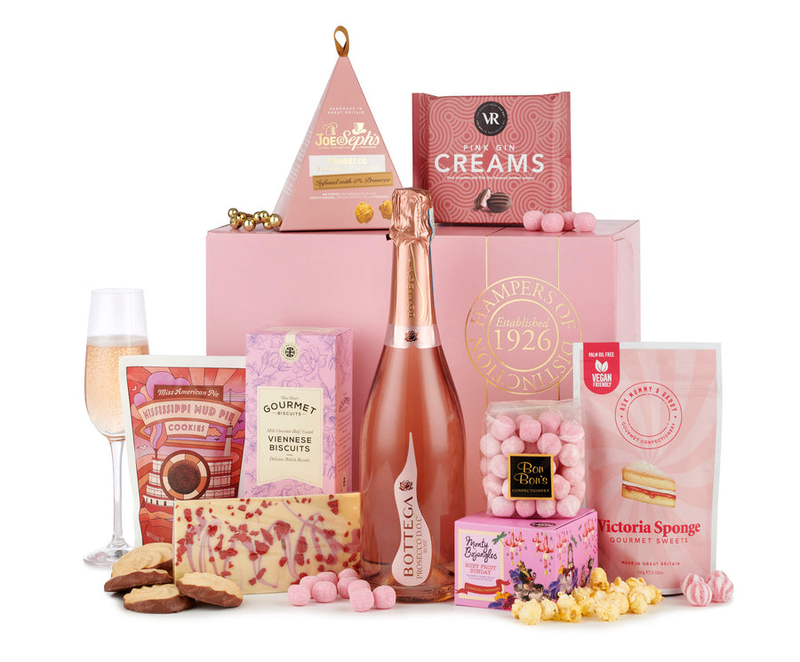 The Luxury Rose Pink Prosecco Gift Box, from Spicers of Hythe. A fizz gift box, featuring a range of artisan treats including chocolate, sweets, shortbread, tienesse biscuits, Victoria sponge sweets and more.